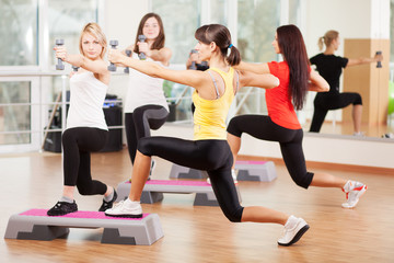 Fototapeta na wymiar Group training in a fitness center