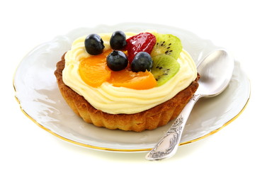 Cake with cream and fruit.