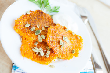 sweet pancakes with pumpkin and pumpkin seeds