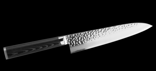 Japanese gyuto knife of damascus steel, isolated