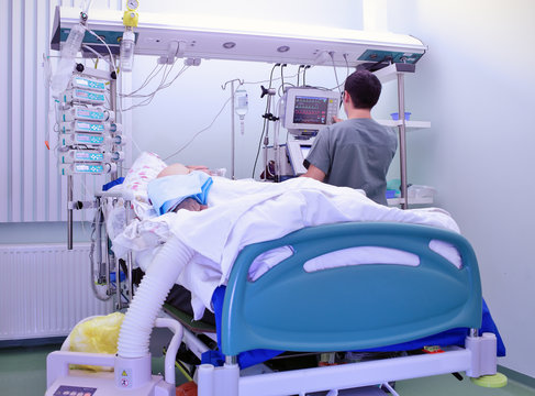 Medical personnel near heavy patient