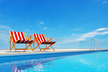 Swimming pool with beach chairs