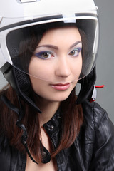 Beautiful woman in helmet on head