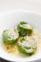 Green ravioli in plate close-up