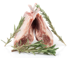 Raw rack of lamb with rosemary, isolated on white