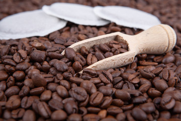 coffee beans and wooden scoop