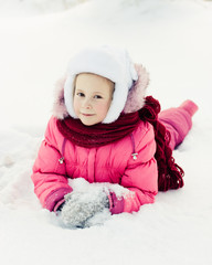 Beautiful happy girl in the red jacket