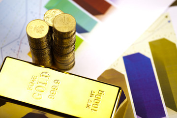 Gold bars and coins 