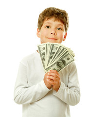 A smiling little boy is counting money - on white background