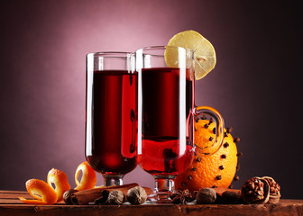 mulled wine in the glasses, spice and orange