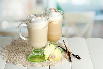 Fragrant coffee latte in glasses cups with spices,