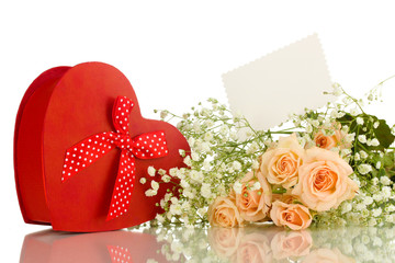 Fototapeta premium Giftbox and flowers isolated on white