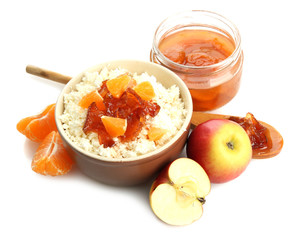 cottage cheese in bowl with homemade fruit jam, isolated