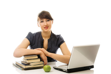 girl with books and laptop isolated on white background