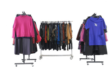 Colorful different autumn/winter clothing on hanging