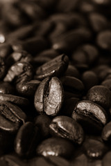 Coffee beans on grunge wooden background