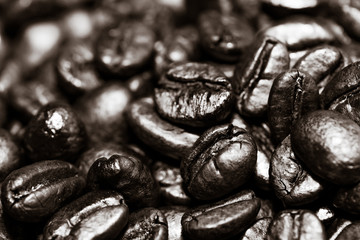 Coffee beans on grunge wooden background