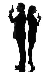 couple woman man detective secret agent criminal  silhouette - obrazy, fototapety, plakaty