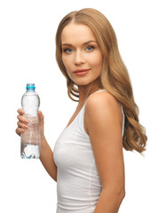 young beautiful woman with  bottle of water