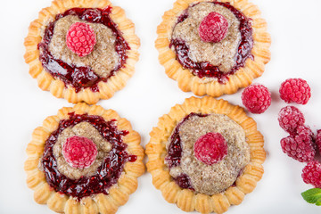 Delicious raspberry cakes with mint and almond cream