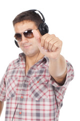 man in glasses with headphones on his head, is Ok