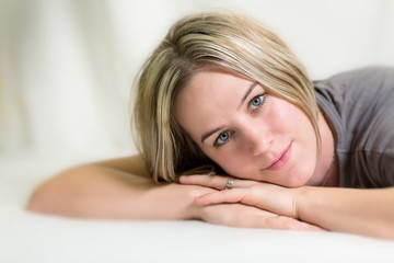 Beautiful woman lying on a bed