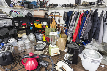 Interior garage sale, housewares, clothing, and more.