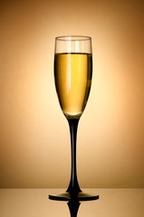 Wineglass  over gold background