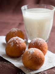 Doughnuts with glass of milk