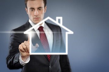 Man with Touchscreen House