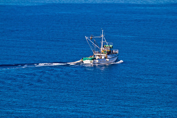 Fishing trawler open water aerial view