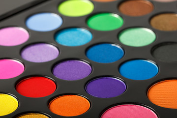 Close-up of colorful eyeshadow palette.