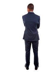 Young business man from the back over a white background