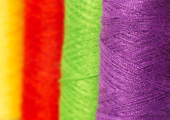 Some coils with multi-colored threads