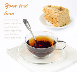 Close-up of glass  cup of tea and tasty cake