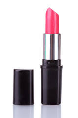 Red lipstick isolated on white background