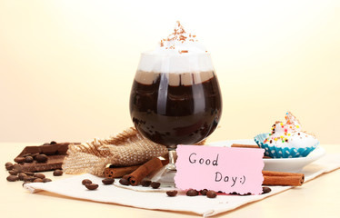 glass of coffee cocktail on wooden table