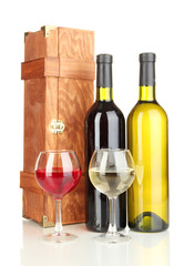 Wooden case with wine bottles isolated on white