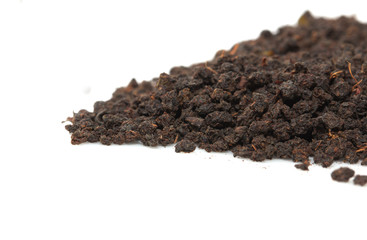 black tea on a white background. macro