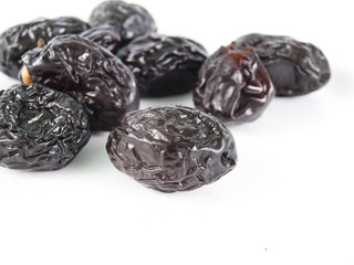 prunes on a white background