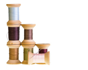 Spools of thread isolated on white