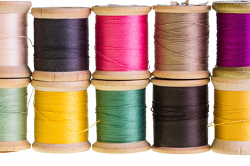 Spools of thread isolated on white
