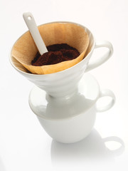 Portable china filter with ground coffee