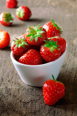 Bowl of fresh ripe red strawberries