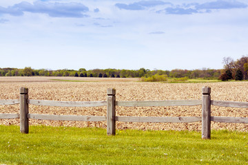 wooden fence on american countryside