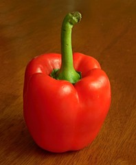 red paprika on wooden surface