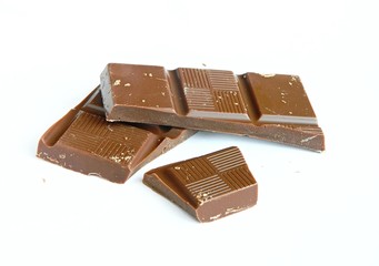 chocolate bars over white background