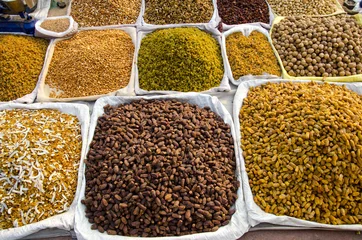 Keuken spatwand met foto various dry fruits and nuts in India market © Alis Photo