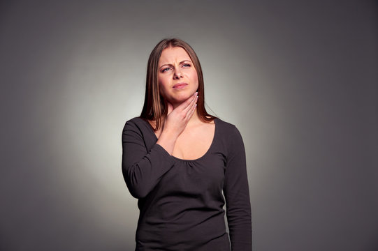 woman have a throat pain