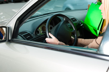 Women was shopping and driving home